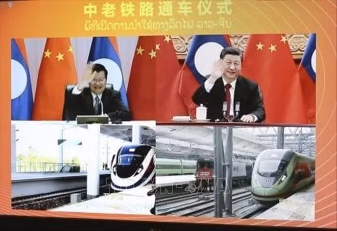Les dirigeants du Laos et de la Chine s'engagent à renforcer les relations bilatérales ảnh 1