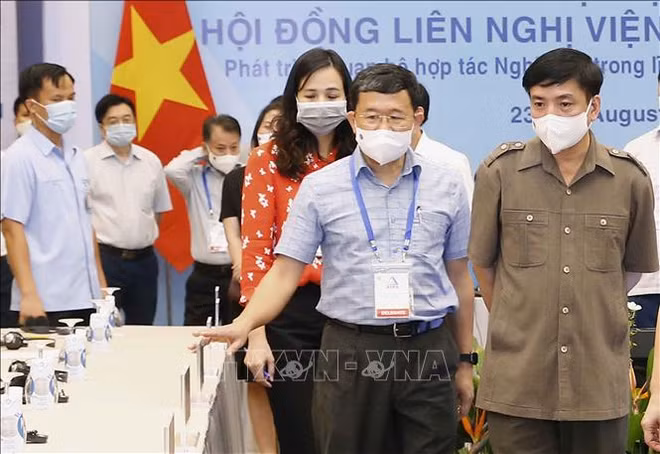 Inspection des préparatifs pour la participation du Vietnam à l’AIPA-42 ảnh 1