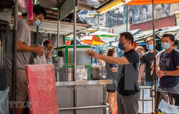 COVID-19 : La Malaisie interdit toutes les activités non essentielles ảnh 1