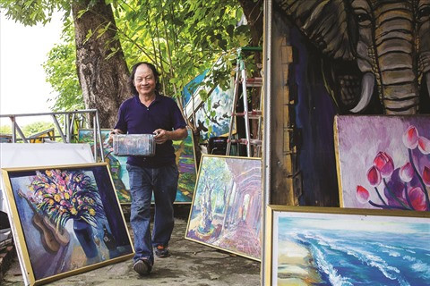 Le vieux peintre du pont Long Biên ảnh 1