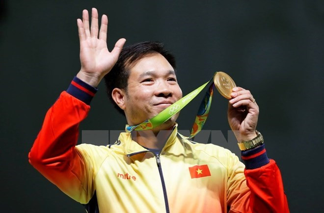 Hoang Xuan Vinh remporte la première médaille d'or aux JO pour le Vietnam ảnh 1 Hoang Xuan Vinh remporte la première médaille d'or aux JO pour le Vietnam ảnh 1
