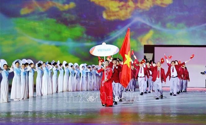 Le nageur Nguyên Huy Hoàng, porte-drapeau de la délégation vietnamienve aux SEA Games 32 ảnh 1 Le nageur Nguyên Huy Hoàng, porte-drapeau de la délégation vietnamienve aux SEA Games 32 ảnh 1