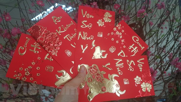 Têt : la coutume des « Lì xì » des Vietnamiens ảnh 1 Têt : la coutume des « Lì xì » des Vietnamiens ảnh 1