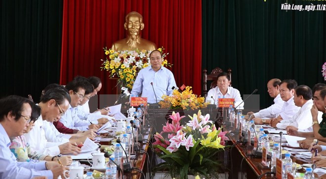 Le Premier ministre Nguyên Xuân Phuc en tournée à Vinh Long ảnh 1 Le Premier ministre Nguyên Xuân Phuc en tournée à Vinh Long ảnh 1
