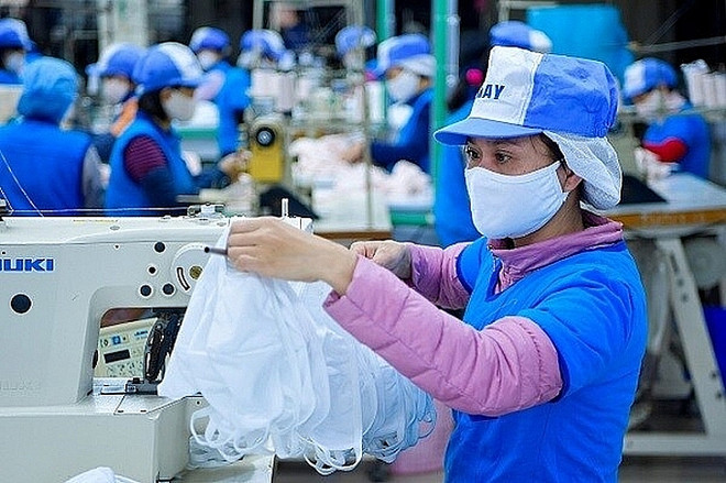 Le Vietnam peut devenir un grand producteur de masques en tissu ảnh 1 Le Vietnam peut devenir un grand producteur de masques en tissu ảnh 1