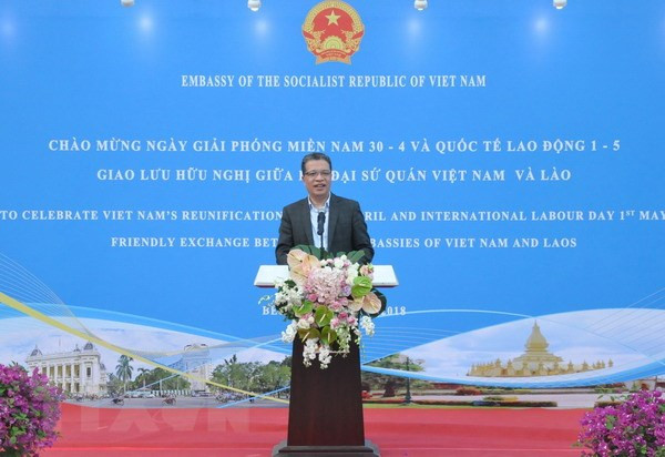L'échange d'amitié Vietnam - Laos en Chine ảnh 1