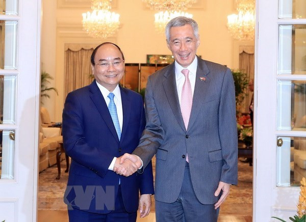 La visite du PM vietnamien et sa participation au 32e sommet de l'ASEAN à Singapour est un bon succès ảnh 1 La visite du PM vietnamien et sa participation au 32e sommet de l'ASEAN à Singapour est un bon succès ảnh 1