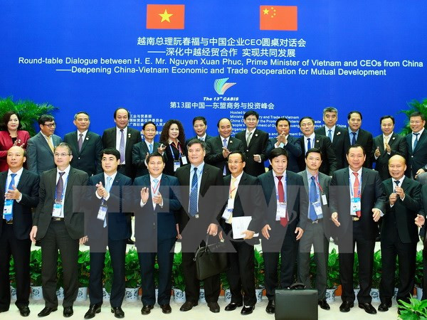 Le Premier ministre dialogue avec des hommes d'affaires chinois ảnh 1 Le Premier ministre dialogue avec des hommes d'affaires chinois ảnh 1