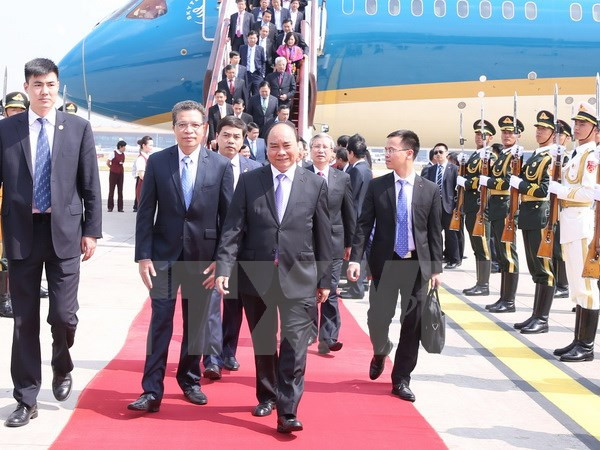 Le PM Nguyen Xuan Phuc est arrivé à Pékin pour une visite officielle en Chine ảnh 1 Le PM Nguyen Xuan Phuc est arrivé à Pékin pour une visite officielle en Chine ảnh 1