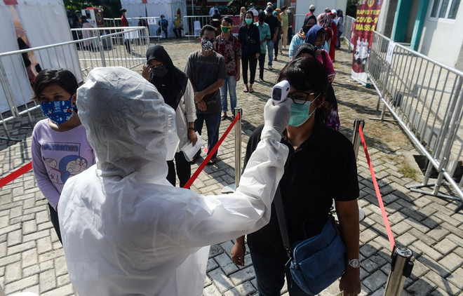 L'Indonésie privilégie le développement économique et la protection de la santé des habitants ảnh 1