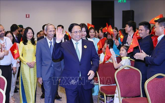 Le PM Pham Minh Chinh rencontre la communauté vietnamienne en Arabie saoudite ảnh 1 Le PM Pham Minh Chinh rencontre la communauté vietnamienne en Arabie saoudite ảnh 1
