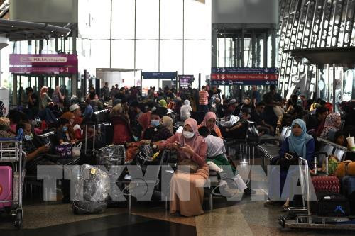 2019-nCoV : un patient chinois en Malaisie guéri par le médicament anti-VIH/SIDA ảnh 1