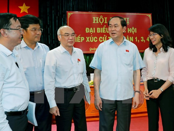 Le président Tran Dai Quang rencontre des électeurs de Ho Chi Minh-Ville ảnh 1