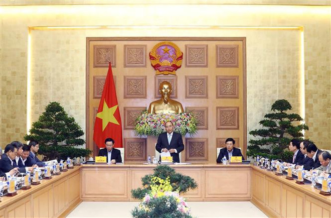 Le PM Nguyen Xuan Phuc travaille avec son groupe de conseillers économiques ảnh 1 Le PM Nguyen Xuan Phuc travaille avec son groupe de conseillers économiques ảnh 1