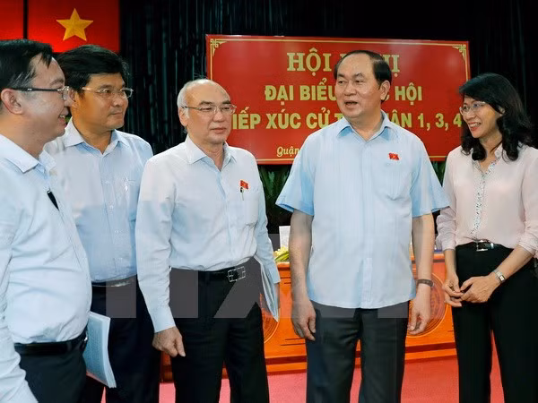 Le président Tran Dai Quang rencontre des électeurs de Ho Chi Minh-Ville ảnh 1