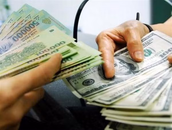 Dépréciation du dollar américain face au dông vietnamien ảnh 1