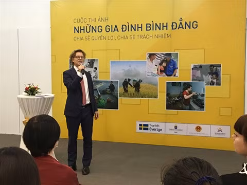 Lancement du concours photographique «Les familles vietnamiennes égalitaires» ảnh 1