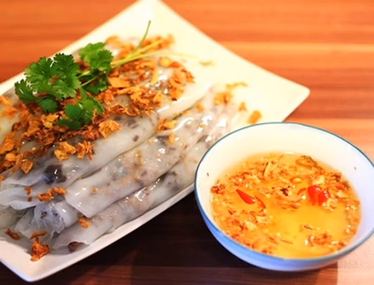 Le bánh cuốn élu parmi les 10 meilleurs plats de 2023 ảnh 1
