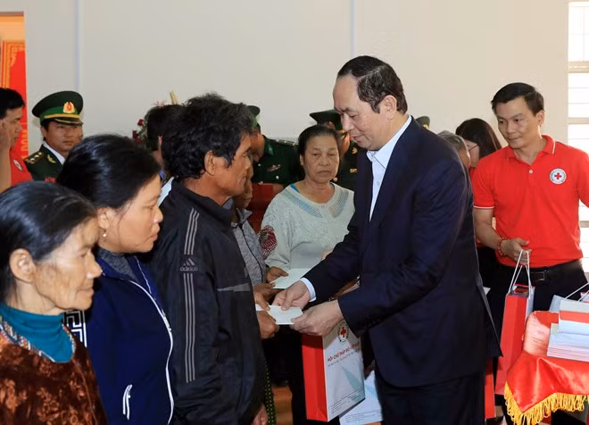 Têt : le président Trân Dai Quang rend visite à des cadres, soldats et habitants de Gia Lai ảnh 1