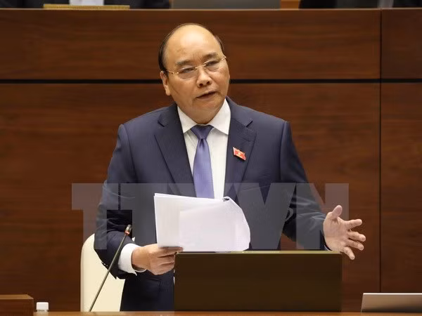 Le Premier ministre répond à des questions des députés ảnh 1
