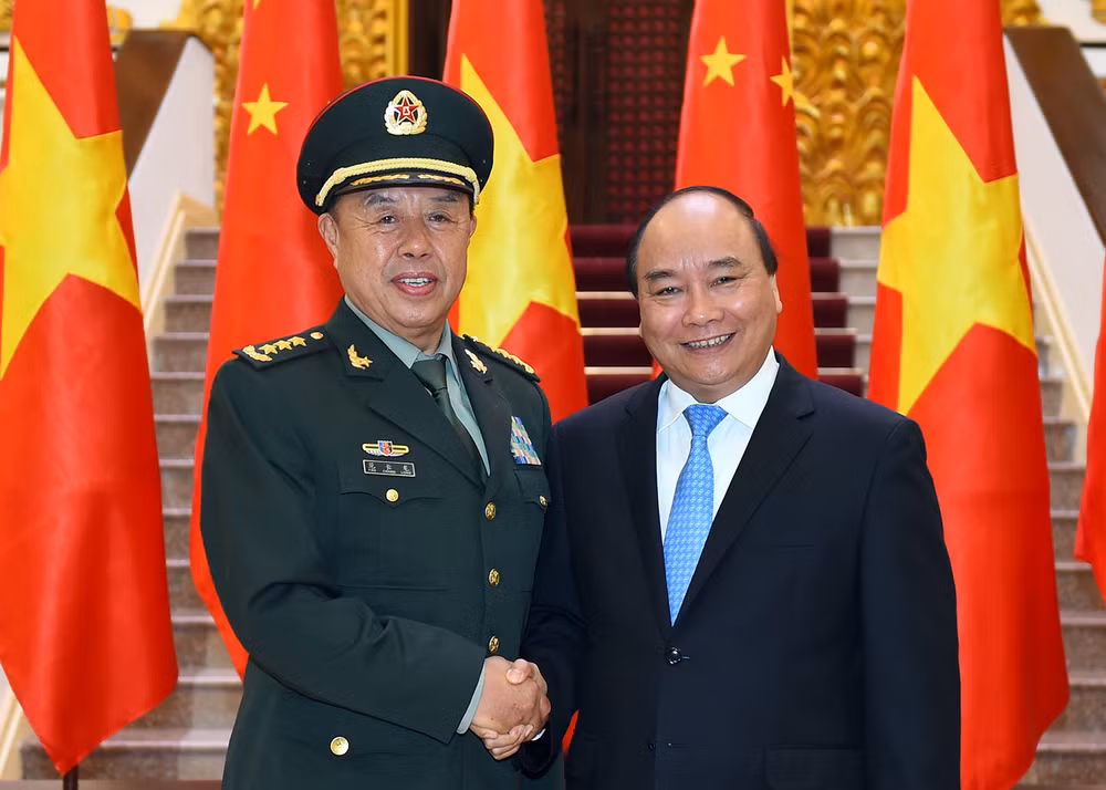 Le leader du PCV et le PM reçoivent le vice-président de la Commission militaire centrale chinoise ảnh 2