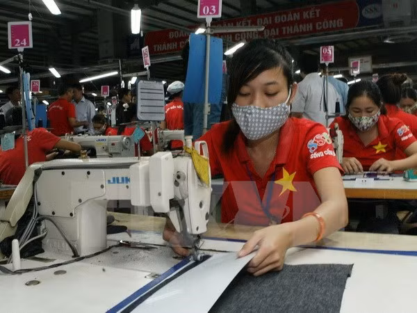 Journal de Hongkong : le Vietnam aura plus à gagner qu’à perdre au TPP ảnh 1