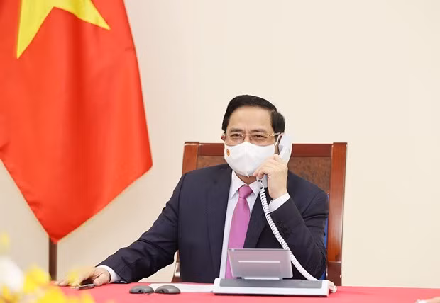 Vietnam-Thaïlande : conversation téléphonique entre les deux PM Pham Minh Chinh – Prayut Chan-O-cha ảnh 1