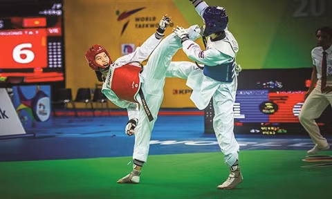 Taekwondo : le rêve olympique devenu réalité pour la championne Kim Tuyên ảnh 2