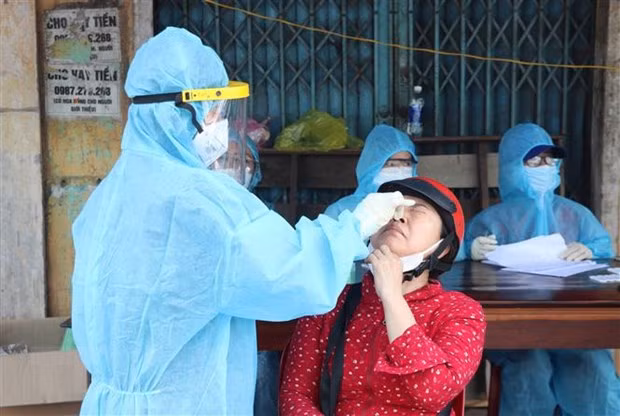 COVID-19 : Le Vietnam signale 11.692 nouveaux cas en 24 heures ảnh 1