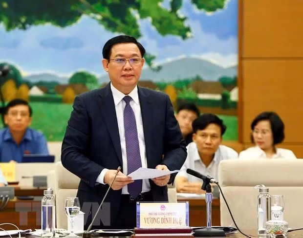 Le vice-PM Vuong Dinh Hue souligne la détermination à lutter contre la corruption ảnh 1