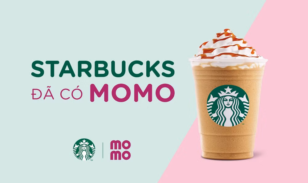 MoMo fournit un service de paiement aux clients de Starbucks Vietnam ảnh 1