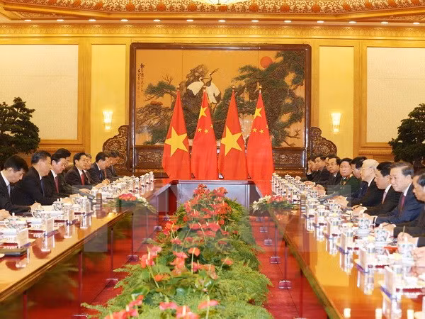Le SG Nguyên Phu Trong s’entretient avec le SG et président chinois Xi Jinping ảnh 1