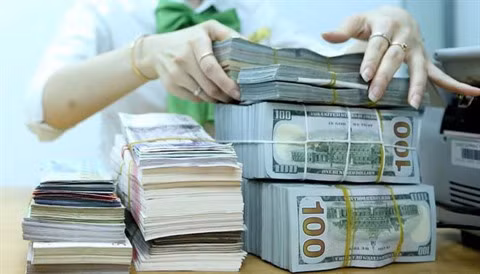 Prévisions sur les effets au marché financier du Vietnam après la décision de la Fed ảnh 1
