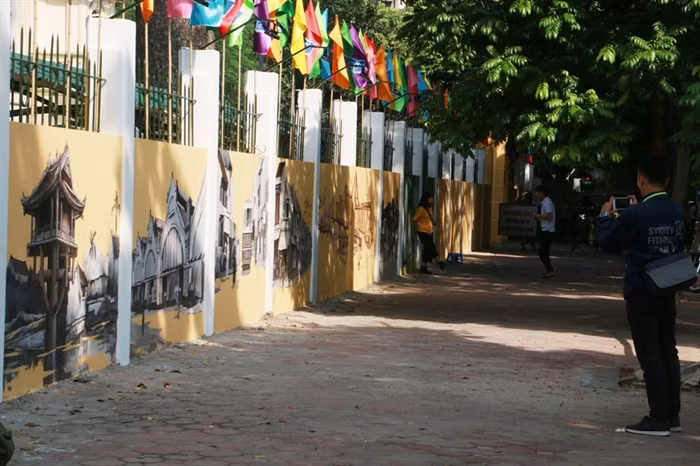 Des peintures murales font revivre Hanoi d'antan ảnh 1