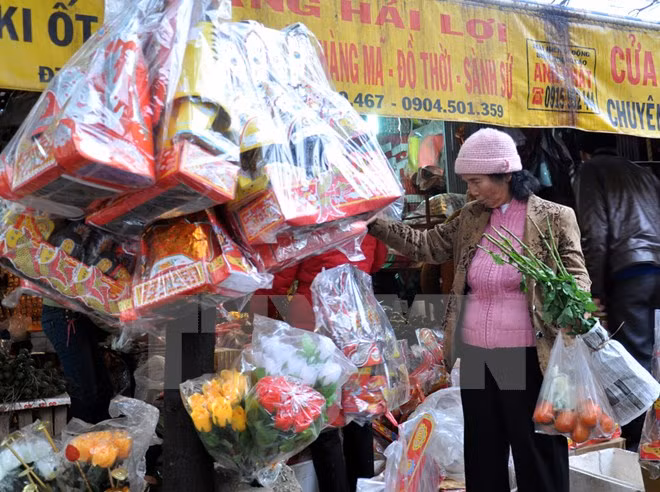 Avant le Têt, les Vietnamiens fêtent le jour des Tao Quan ảnh 1