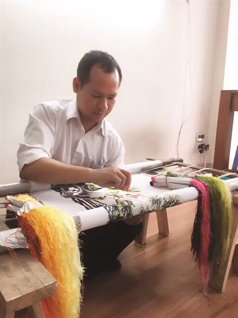 Un maître de la peinture à l’aiguille ảnh 1 Un maître de la peinture à l’aiguille ảnh 1