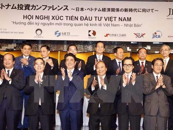 Le PM participe à une conférence sur la promotion de l’investissement vietnamien au Japon ảnh 1