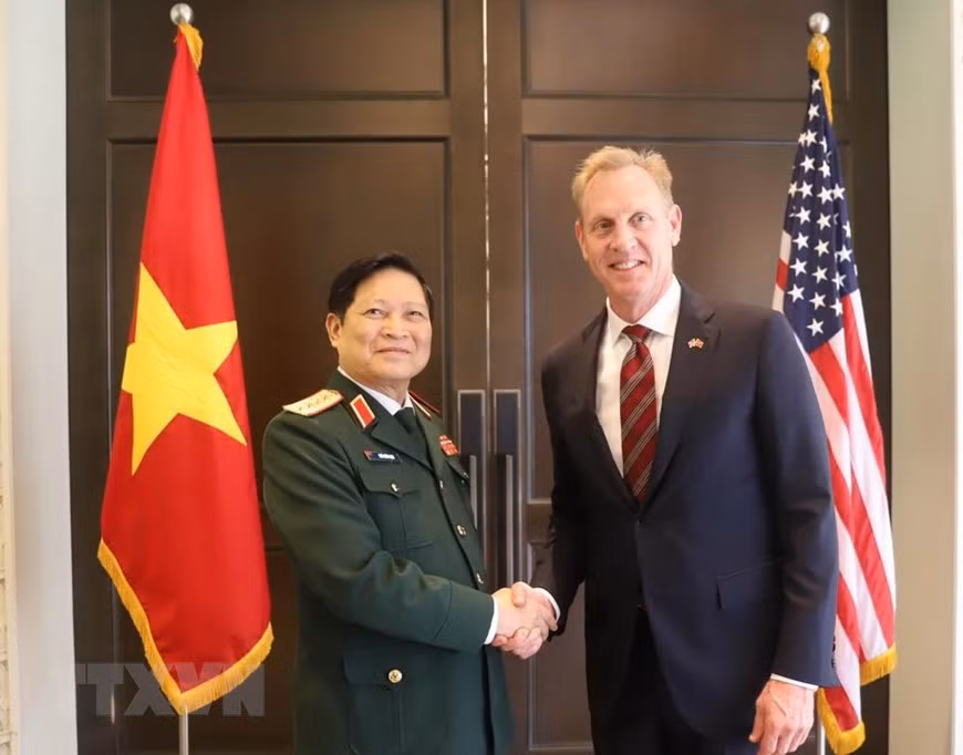 Activités du ministre de la Défense Ngô Xuân Lich en marge du 18e Dialoguie Shangri-La ảnh 1