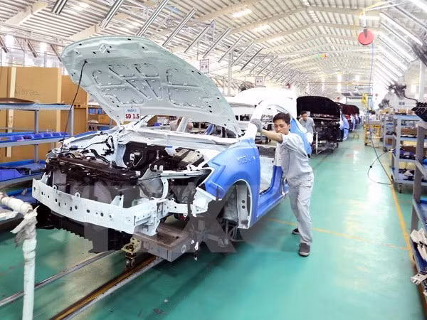 Automobile : coopération vietnamo-chinoise dans la production de pièces détachées ảnh 1