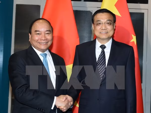 Le PM Nguyên Xuân Phuc rencontre ses homologues chinois, laotien et le président bulgare ảnh 1