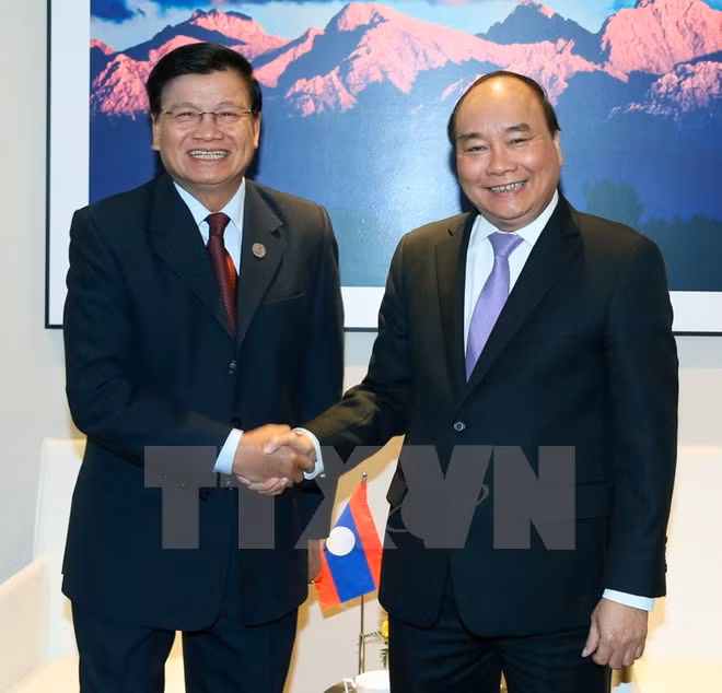 Le PM Nguyên Xuân Phuc rencontre ses homologues chinois, laotien et le président bulgare ảnh 2