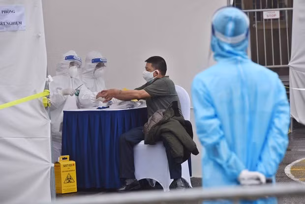 Le Vietnam signale quatre autres cas de COVID-19 pour un total de 237 ảnh 1