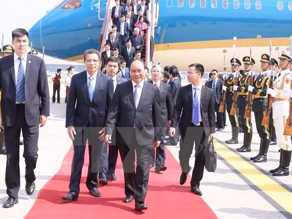 Le PM Nguyen Xuan Phuc est arrivé à Pékin pour une visite officielle en Chine ảnh 1