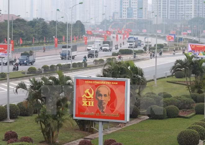 Xinhua et Kyodo couvrent le XIIe Congrès national du PCV ảnh 1