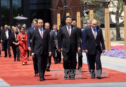 Le président Tran Dai Quang termine sa visite d'Etat en Chine ảnh 1