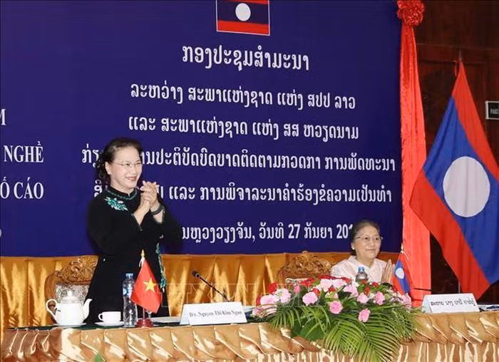 AN : séminaire Vietnam-Laos sur la formation professionnelle et le règlement des recours ảnh 1