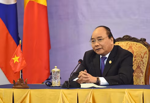 Remise de 5 tonnes de riz aux Viet kieu démunis de Siem Reap ảnh 1