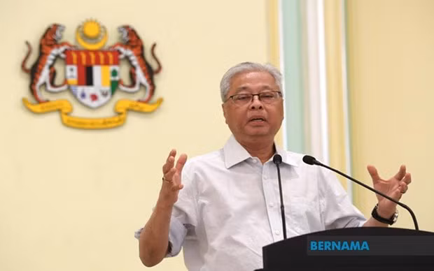 Les ministres de la Défense de la Malaisie et de la Chine discutent de leur coopération bilatérale ảnh 1