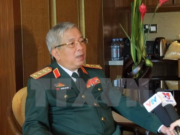 Le vice-ministre de la Défense Nguyen Chi Vinh reçoit des hôtes américain et sud-coréen ảnh 1