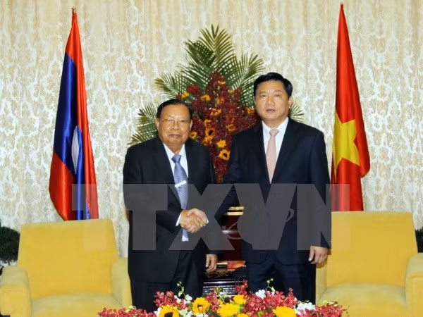 Activités du secrétaire général du Parti et président du Laos au Vietnam ảnh 1